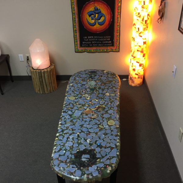 The top of the Crystal Angel Bed has many different stones.